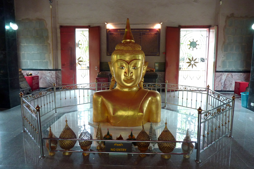 Wat Phra Thong in Phuket, featuring a buried Buddha statue